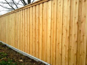 Natural board on board fence stained cedar fence