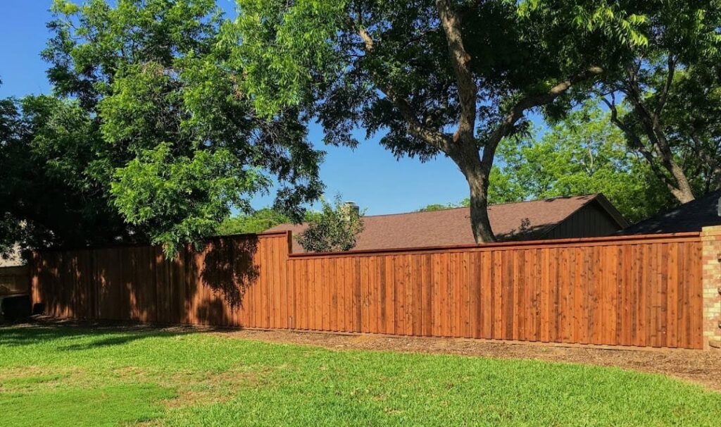 Cap and trim cedar board on board fence
