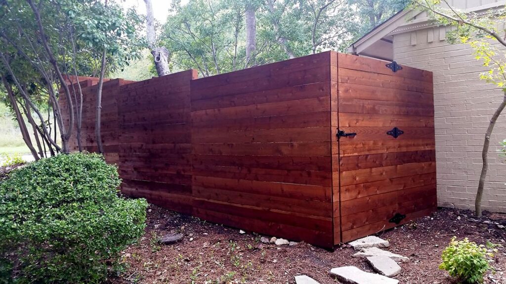 Horizontal stair step cedar fence with gate