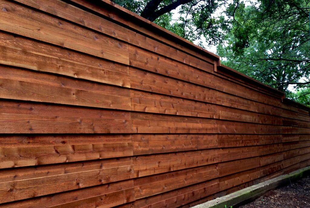 Horizontal board on board wood fence cap and trim