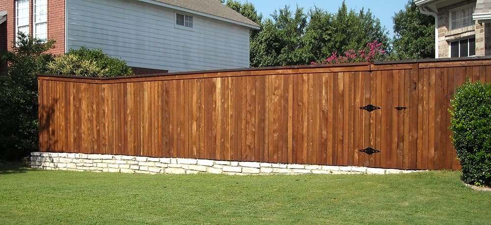 Stained Wooden Fence on Property