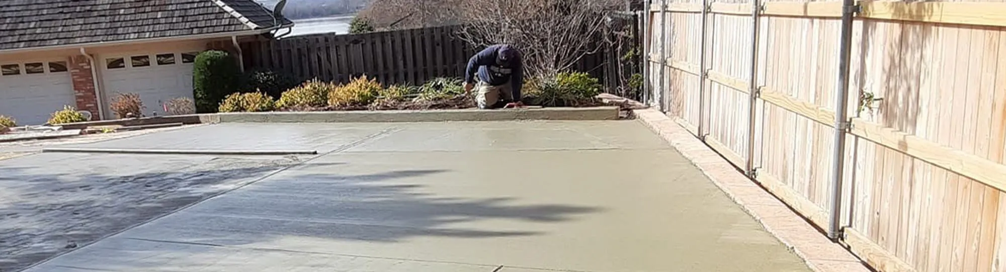 a man installing a residential concrete driveway