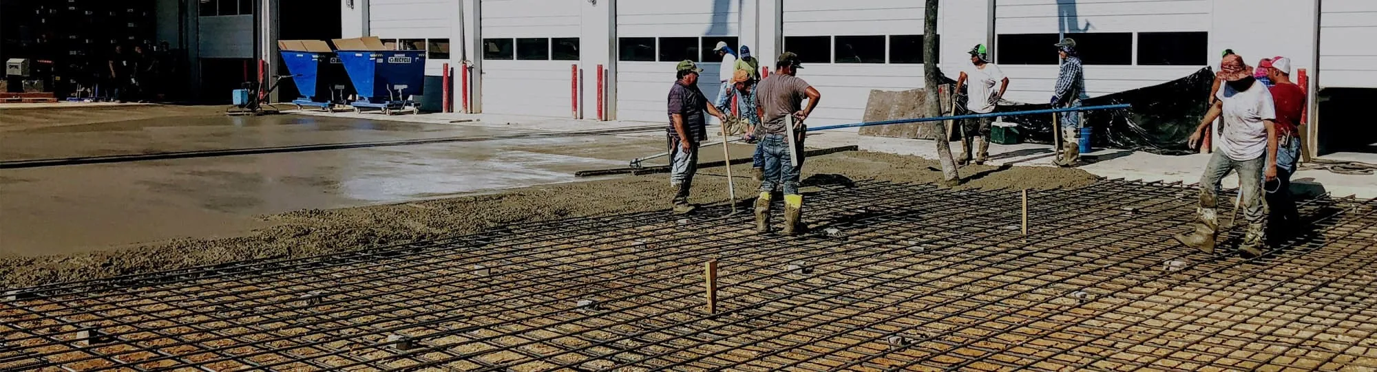workers installing commercial concrete