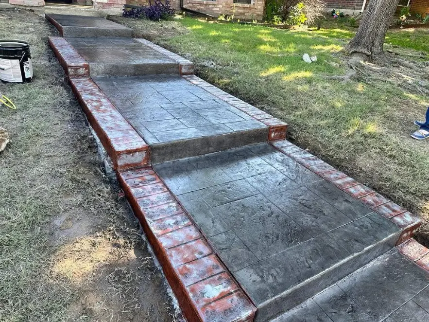 Stamped and stained pathway for residential concrete project