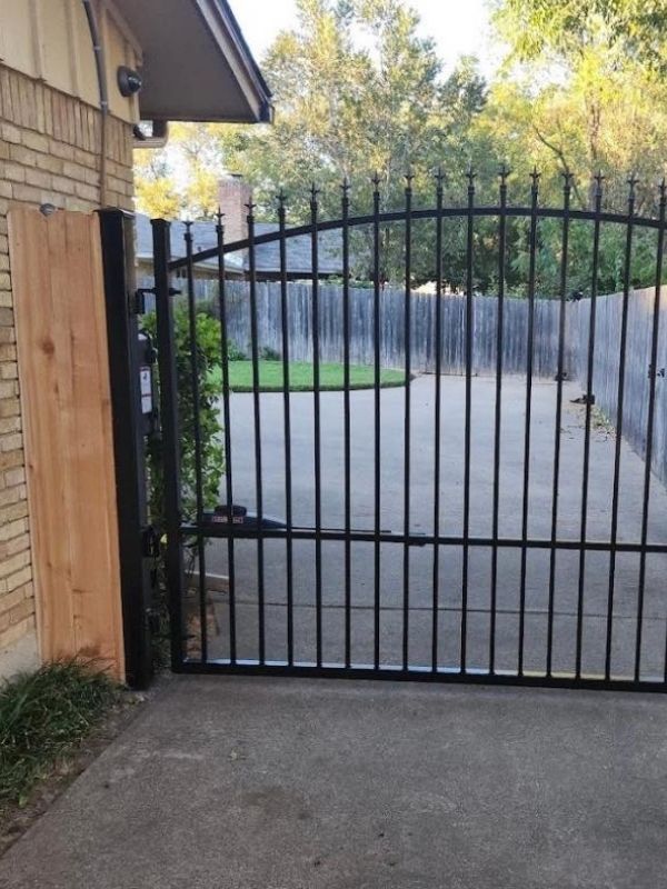 A close-up of an automatic swing gate.