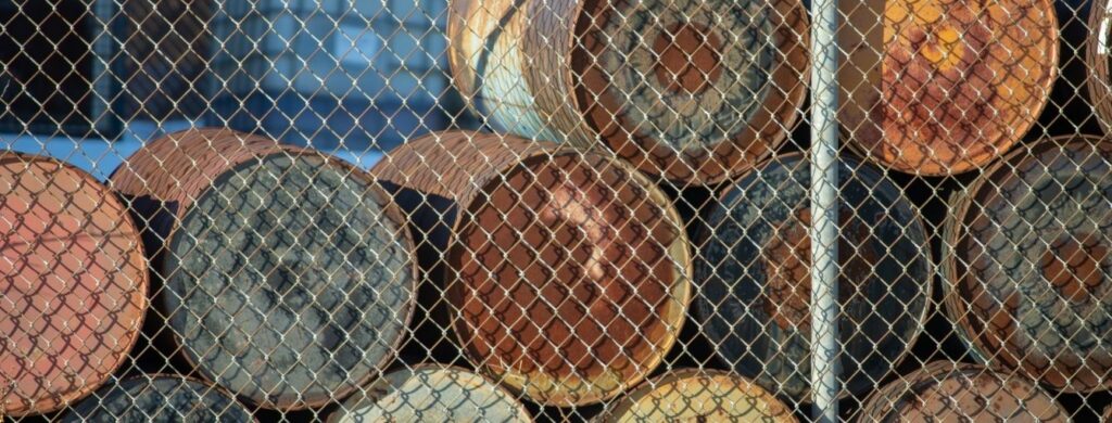 A commercial chain link fence at a manufacturing and packaging plant. 