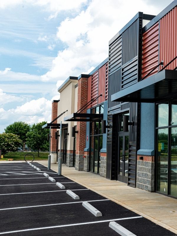 A new parkling lot at a strip mall. 