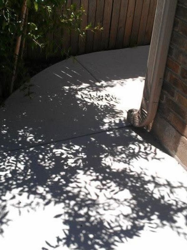 A sidewalk installed around a home.