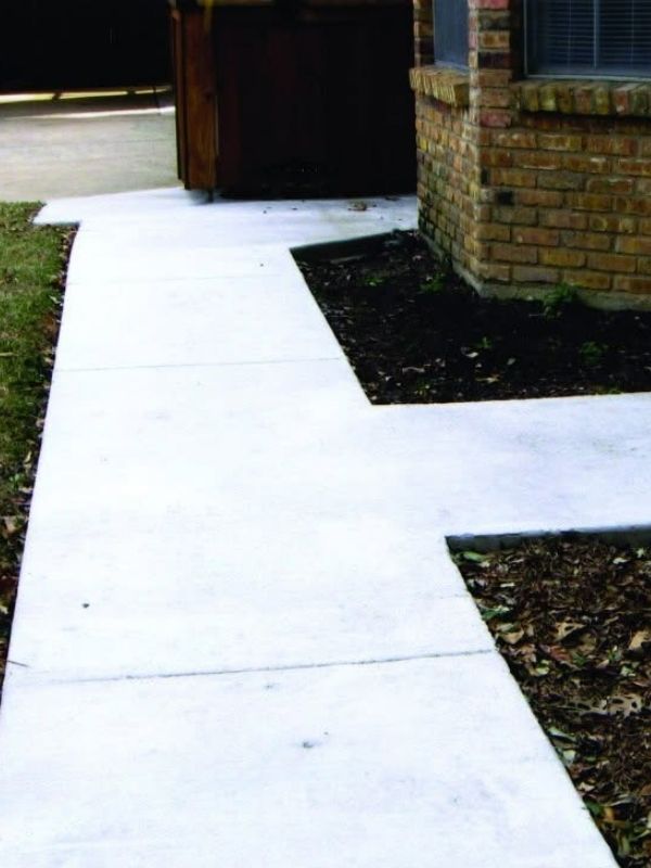 A walkway installed outside of a house.