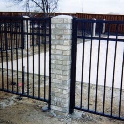 Iron fence with masonry work