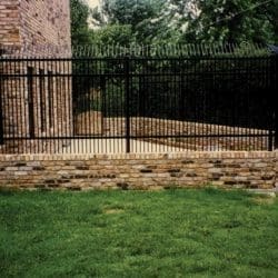 High picket-top iron security fence
