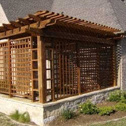 Cedar pergola and slatted walls for shade control